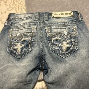 Rock revival woman’s boot leg destroyed jeans